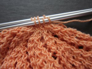 Divide stitches on 2 needles