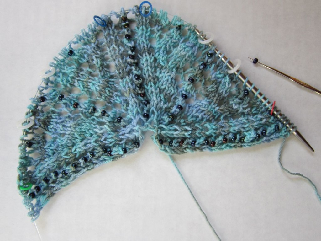 Your in-progress Dolly's Top-Down Tri Shawl will look similar to this