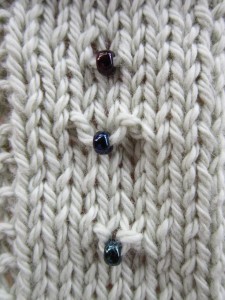 3 similar, yet different, methods of bead placement in knitting