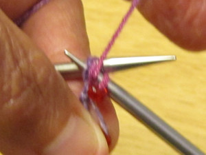 insert right-hand needle tip into next 2 stitches