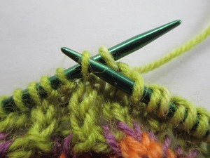 insert right-hand needle purlwise into next unworked stitch 