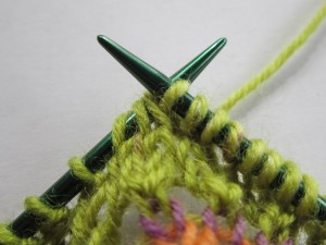 pull yarn through all 3 stitches