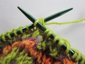 pull yarn through all 3 stitches