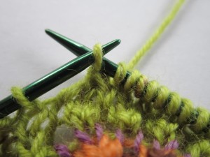 move stitch just made to left-hand needle